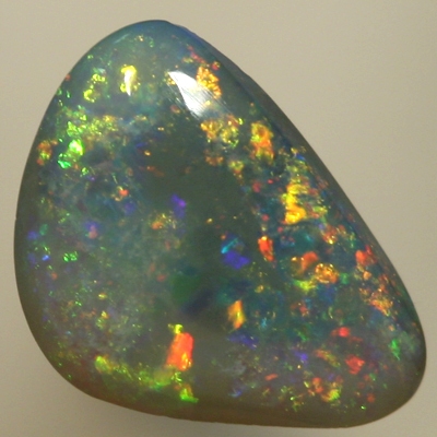 SOLID SEMI BLACK OPAL Bright sparkles, orange and greens with a touch of blue